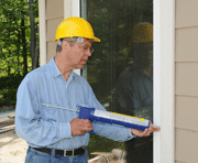 Technican-sealing-air-leaks air leaks in your home, Boston, Northborough MA